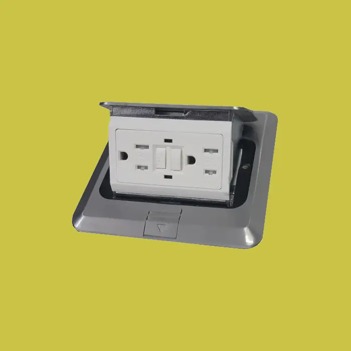 Grommet redondo instalado en piso con cables